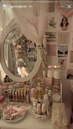 there is a vanity with many items on the table and in front of a mirror