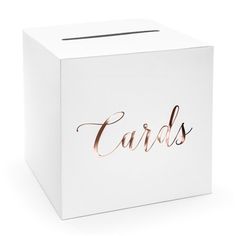 a white box with the word cards printed on it and rose gold foil lettering that says cards