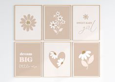 four framed pictures with flowers and hearts on them, all in neutral colors are shown