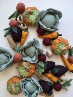 a pile of stuffed vegetables sitting on top of a white table next to each other