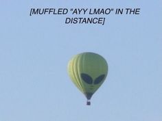 an alien balloon flying in the sky with words above it that read, muffled'ay lamo'in the distance