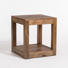 a small wooden square table with one shelf on the bottom and two shelves at the top