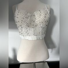 White Windsor Cropped Bustier With Pearls And Gems. Never Worn. Size Large, Adjustable And Straps Can Be Removed. Party Corset With Straps In Crop Top Style, Sleeveless Party Crop Top With Boned Bodice, Sleeveless Boned Bodice Crop Top For Party, Summer Party Bra With Built-in Support, Party Sleeveless Tube Top With Removable Bra Pads, Fitted Cami Bra For Parties, Fitted Cami Bra For Party, Party Cami Bra With Built-in Support, Party Bandeau Crop Top With Removable Bra Pads