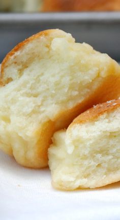 two pieces of bread sitting on top of a white plate