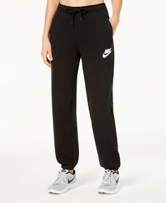 Nike Women's Sportswear Rally Relaxed Fleece Pants Style#: 931866-010 Black Size: XXL Your favorite joggers are recast with relaxed lines and super-soft fleece in these comfortable pants from Nike Sportswear. An adjustable waistband lets you customize the fit. Mid rise; full length: approx. inseam 30" INSPIRED FOR: Athleisure Smooth fleece fabric Stretchy elastic waistband with drawstring; hand pockets at sides The Logo Matched Set featured on The Gift List Cotton/rayon/polyester; pocket bags: c Athleisure Joggers With Logo Detail For Jogging, Sportswear Joggers With Logo Detail For Jogging, Sporty Jogging Bottoms With Logo Detail, Sporty Bottoms With Logo Detail For Jogging, Sporty Logo Detail Bottoms For Jogging, Athleisure Sports Bottoms With Logo Detail, Athleisure Joggers With Logo Detail For Sports, Black Joggers With Logo For Loungewear, Black Logo Sweatpants For Loungewear