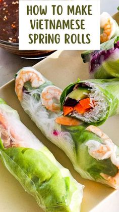 vietnamese spring rolls on a plate with dipping sauce in the background and text overlay reading how to make vietnamese spring rolls