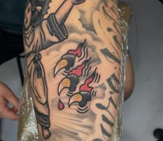 a person with a tattoo on their arm