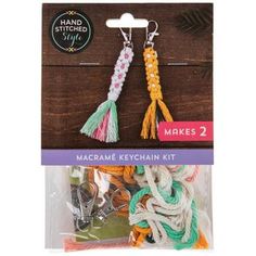 the macrame keychain kit is packaged in a package with two different colors