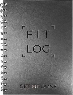 a spiral notebook with the words fit log on it