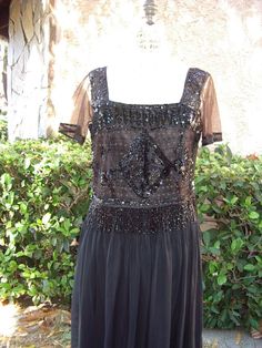 "Vintage 1930's Beaded Cropped Waist Length Top with Fitted attached under camisole and ribbon waistband.  The beaded Bodice has a square neckline and short sleeves, it is beaded in a floral pattern with a diamond center in black sequins and tiny jet  beads ending with 3\" beaded fringe hem.  I have restored all the loose beading on the bodice which took many hours, before offering for sale.  The bodice camisole has a separating zipper that was probably added a a later date I added an original 1 Chiffon Long Skirt, Long Chiffon Skirt, Rayon Skirt, Beaded Bodice, Beaded Top, Chiffon Skirt, Beaded Fringe, Waist Length, Black Sequins