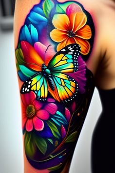 a woman's colorful tattoo with butterflies and flowers