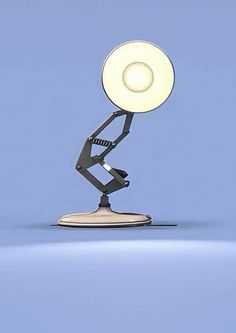 a lamp that is sitting on top of a stand with a light in the middle