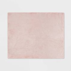 a pink rug on a white background