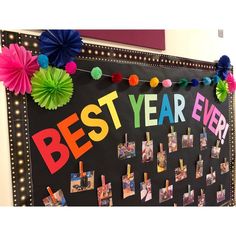 the best year ever bulletin board is decorated with colorful paper flowers and pom poms