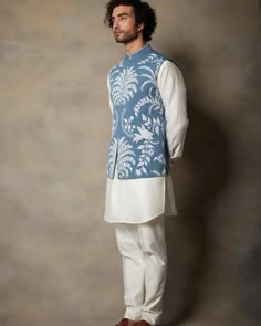 Blue applique jackate set to make you glow bright and shine.                                                    Style and Work - Crafted in comfortable cotton, this jackate is designed in a sky blue shade and of white kurta(shirt) Luxury Nehru Jacket With Embroidered Sleeves, Luxury Designer Yellow Nehru Jacket, Cotton Bandhgala With Printed Motifs For Festive Occasions, Sadri Designs For Men, White Chikankari Embroidery Outerwear For Eid, Light Blue Cotton Kurta With Long Sleeves, White Cotton Nehru Jacket For Festive Occasions, Blue Cotton Nehru Jacket With Resham Embroidery, Cotton Bandhgala With Printed Motifs For Eid