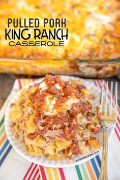 pulled pork king ranch casserole on a paper plate with a fork next to it