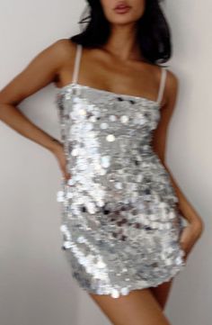 Silver Sequin Mini Dress

This item runs large, please size down

How to style:
Bring the disco to the party with this silver sequin () mini dress ()! This bold piece is perfect for concerts or a party! Pair it with dainty silver jewellery and cowboy boots () to complete the look.

Features:


  
 * Removable and adjustable spaghetti straps 
 * Silver sequin outer 
 * Bodycon fit 
 * Fully lined 
 * Mini length 
 * Slight stretch 
 * Mid weight material 
 * Pull on style 
 * It is recommended to Silver Big Sequin Dress, Sparkle Vegas Outfit, New Year Eve Party Outfit, Gold And Silver Bachelorette Party, Sequin Outfits For Women, Silver Dress Accessories, All Silver Outfit, Concert Outfit Ideas Rap, Silver Dress Aesthetic