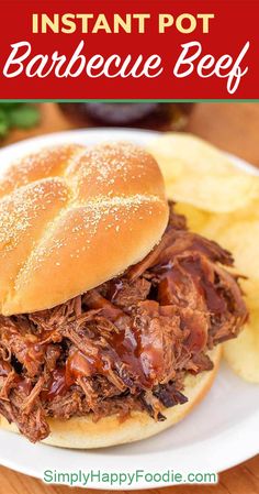 a pulled pork sandwich on a plate with potato wedges