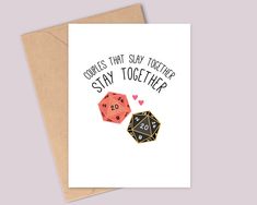 a card with two dices and the words couples that say together stay together