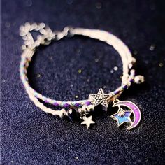 Adjustable Star And Moon Bracelet For Women And Girls - Dreamy And Stylish Design. Description Versatile Design: Features A Beautiful Combination Of Moon And Star And Dreamy Planet Charm That Can Be Worn By Both Men And Women. Adjust Fit : The Bracelet Can Be Easily Adjustable To Fit Any Size, Ensuring A Comfortable And Secure Fit. Durable Material: Made Of Hight -Quality Materials That Are Built To Last , Ensuring Long -Lasting Wear. Provided By Orangejuice Jewelry Imported Moon And Star Bracelet, Moon Bracelet, Star And Moon, Magical Jewelry, Jewelry White, Star Bracelet, Moon And Star, Moon Star, Bracelet For Women