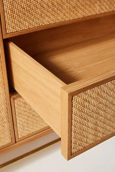 the drawers are made out of wood and wicker