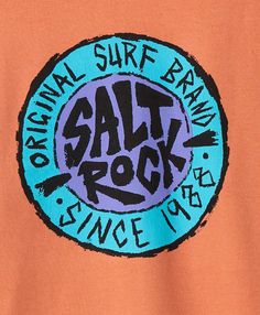 an orange shirt with the words salt rock written in black on it and a blue circle