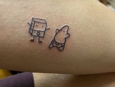 a person with a small tattoo on their arm