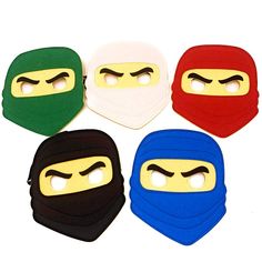 four different colored ninja masks with eyes