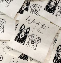 a pile of white napkins with black dogs on them and the names of each dog