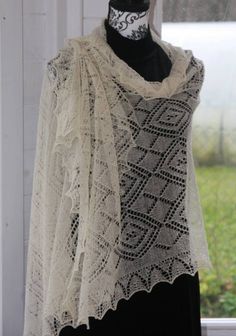 This beautiful, warm, tender, romantic and elegant woman shawl is a perfect addition to the cocktail or evening dress making you look very feminine. It will be perfect even for a bride in wedding. The shawl is inspired by Haapsalu shawl.  Dimensions: approximately 180 x 70 cm Material: 100% fine sheep wool Very elegant, luxurious and embracing present for yourself or your mother or a friend. Care: Hand wash with lukewarm water with soap for wool and silk, squeeze (don't wring) to remove excess water and roll in a clean dry towel. Reshape and lay flat to dry. You can also use pins (or blocking wires) to stretch the shawl and keep the pattern nice. Elegant Beige Wedding Wraps, Elegant Cream Lace Shawl, Bohemian White Wraps For Wedding, Bride Shawl, Blocking Wires, Lace Shawl, Women Shawl, Ivory Wedding, Sheep Wool