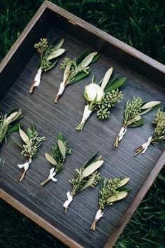 the pinterest page for wedding trend green and white flowers on a wooden tray