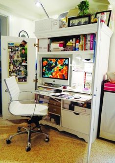 a white desk chair sitting in front of a computer monitor