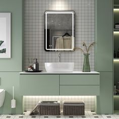 a bathroom with green walls and white tile flooring, along with a large mirror above the sink