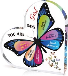 two heart shaped magnets with butterflies and the words god, you are loved on them