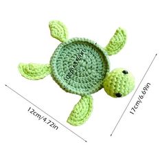 a crocheted turtle toy with the name on it