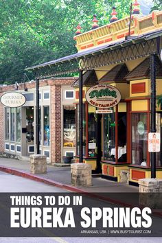 there is a small store on the side of the street that says things to do in eureka springs