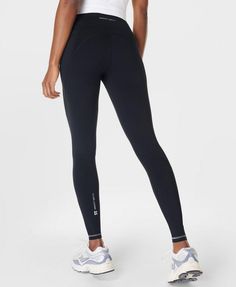 Our outdoor workout leggings with extra compression and an updated fit. Heavier-weighted Power fabric is sweat-wicking, breathable and 95% squat-proof, with high compression for maximum support. New waistband with a high rise fit and internal adjustable drawcord. Features five pockets - two slip pockets on each side and one back zipped pocket. Reflective details and updated Sweaty Betty wordmark on the ankle and waistband. Inseam length: 68cm / 27". Model wears size S and is 175cm/5'7" tall. Style Code: SB10029Colour: Black Workout Legging, Black Workout Leggings, Outdoor Workout, Running Leggings, Yoga Shop, Sweaty Betty, Gym Leggings, Squat Proof, Outdoor Workouts