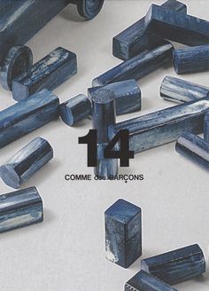 the front cover of a magazine with blue marbles on it