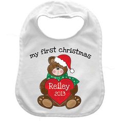 Celebrate your little guy's first Christmas with this Personalized Baby Boy Bib. This adorable bib features a snuggly bear holding a heart that will have your child's name and the year printed on it. Above the bear, it reads, My First Christmas. Simply click the personalize button, type in your baby's name, and click add to cart. We'll print your child's name and the year in a cute font on the heart. You can personalize this bib with a name that contains up to nine characters. Easy to clean, thi My First Christmas Boy, Christmas Day Meals, Bear With Heart, Christmas Bib, Cute Font, Holding A Heart, Baby Boy Bibs, Personalized Baby Bibs, Boy Bib