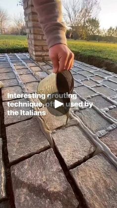 someone pouring cement into a paver with the words, interesting gutia technique on it