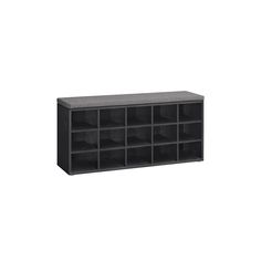 a black shelf with many compartments on it