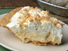 a close up of a piece of cake on a plate with the words amish peanut butter cream pie