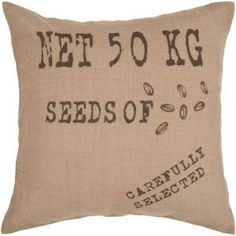 a brown pillow with the words net 50 kg seeds on it and an image of coffee beans