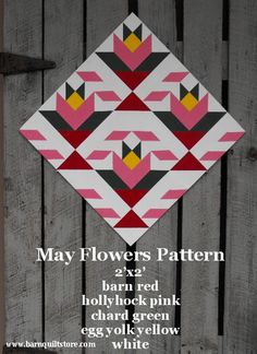 an image of a quilt pattern on a wooden fence with the words may flowers pattern