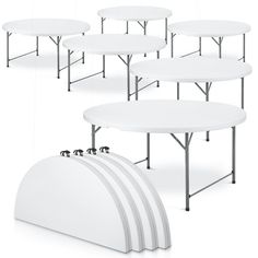 several tables with white plastic tops are shown