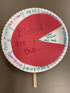 a paper plate with words written on it