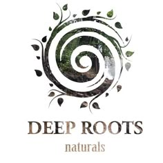 the logo for deep roots naturals, which is located in an area with trees and bushes