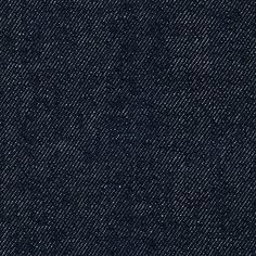 dark blue jeans textured with white dots on the bottom, and an orange stripe at the end