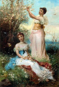 two women are sitting in the grass and one is holding a flower while the other holds a butterfly