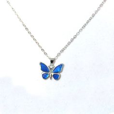 Delicate Mini Blue & Silver Sparkly Butterfly Rhinestone Cute Necklace This Beautiful Blue Butterfly Necklace Will Add Charm To Any Outfit. The Necklace Is 8 1/2" Inches With A 2" Extender. #Butterfly #Bluebutterfly #Sparklybutterfly #Girlie Sparkly Sparkles Blue Butterfly Jewelry, Elegant Blue Rhinestone Necklace Gift, Blue Rhinestone Jewelry For Gifts, Blue Rhinestone Necklace For Party, Elegant Blue Sterling Silver Butterfly Necklace, Blue Butterfly Dress, Butterfly Things, Blue Butterfly Necklace, Sparkly Butterfly